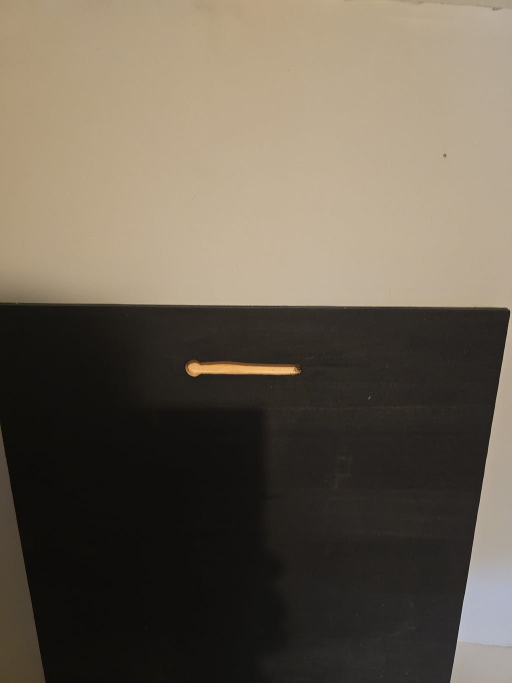 in the photo  it shows how we have a mounting slot in the back of our wood plages