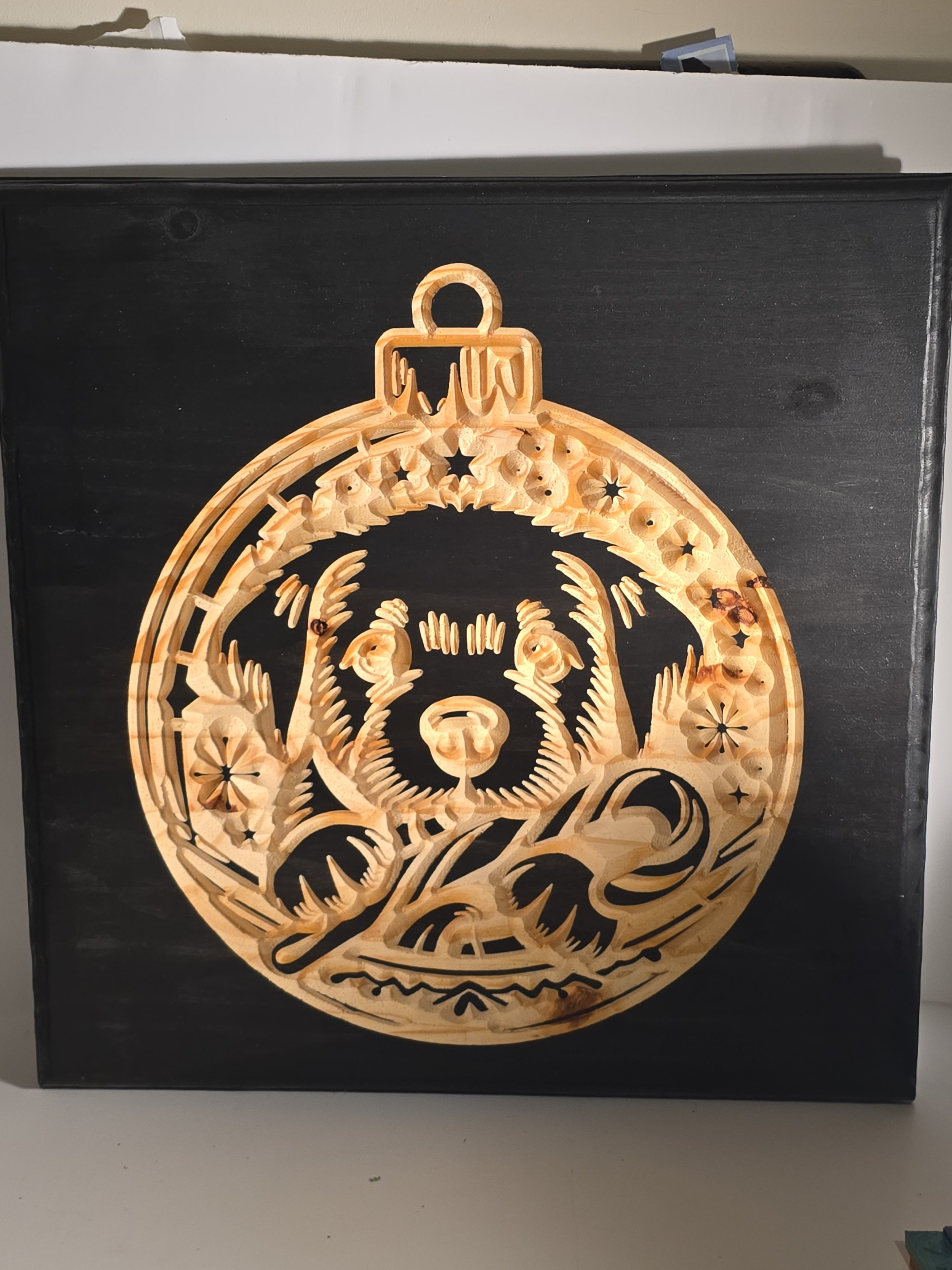 Decorative Christmas bulb on wood plaque